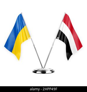 Due bandiere di tabella isolate su sfondo bianco 3D illustrazione, ucraina e yemen Foto Stock