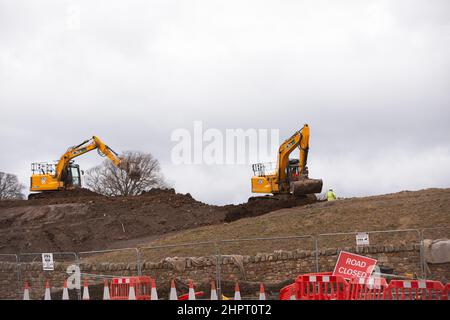 Danderhall, Regno Unito. 23rd Feb 2022. Gli scavatori sono visti in Danderhall rimuovendo la terra. Scozia. PIC Credit: Pako Mera/Alamy Live News Foto Stock