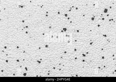 Styrofoam polistirene cartongesso Drywall espanso materiale da costruzione superficie bianca con Abstract Black Pattern Dots Wall Texture background. Foto Stock