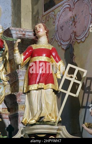 San Lorenzo di Roma, statua sull'altare maggiore nella Chiesa di nostra Signora di Dol a Dol, Croazia Foto Stock