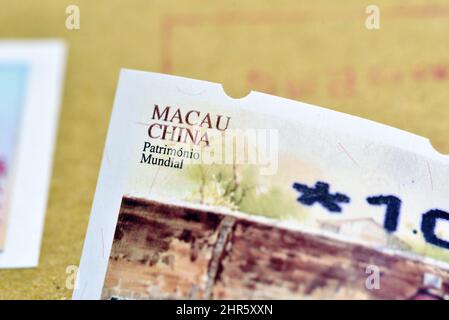 Cina, Macao. Macao è stata sia la prima che l'ultima colonia europea in Cina. Macau timbro postale Foto Stock