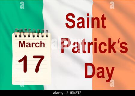 La celebrazione del giorno di San Patrizio con la bandiera irlandese e il calendario che indica il 17 marzo Foto Stock