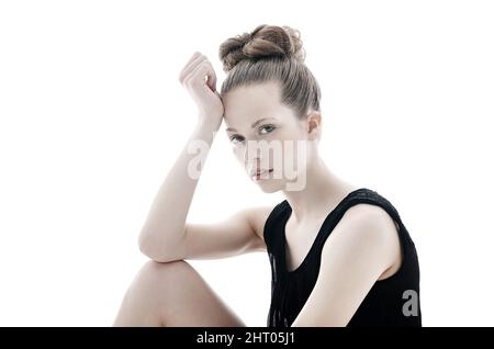 Sogni di ballo. Scatto in studio ritagliato di un giovane ballerino isolato su bianco. Foto Stock