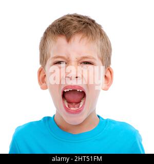 HES crescerà in grande. Studio girato di un ragazzo vestito casualmente isolato su bianco. Foto Stock