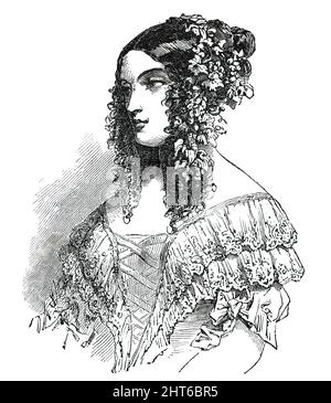 Paris Fashions for June - Ball Dress, 1850. '...un costume da ballo, con un capo-vestito grazioso, composto da una ghirlanda di vite con uva: Su ogni lato appende un mazzo di uve (diversi grappoli sono preferiti). La novità di quest'anno è da osservare nella lunghezza dei rami, che scendono sulle spalle, mescolando con ricci lunghi. Questo capo-vestito è indossato anche con i bandeaux, ma poi la ghirlanda deve essere più spessa nella parte inferiore. Le foglie sono di colori diversi, dalle varie tonalità di verde alla tinta rossa autunnale. Questo tipo di ghirlanda è fatto anche di edera, con piccole palline rosse. Foto Stock
