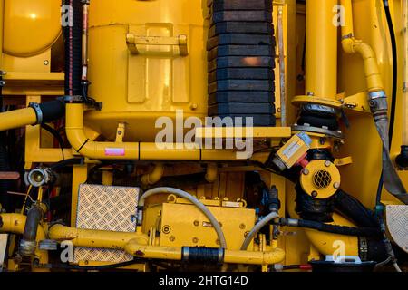 Riassunto di macchine industriali gialle e nere Foto Stock