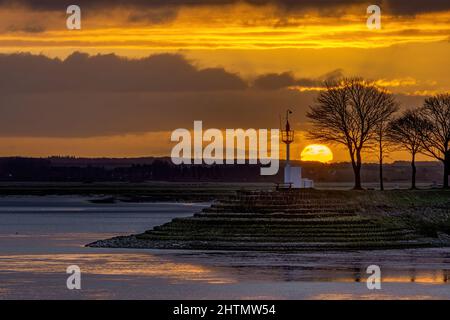 Saint Valery sur Somme, le soleil se lève dans la baie de Somme . Foto Stock