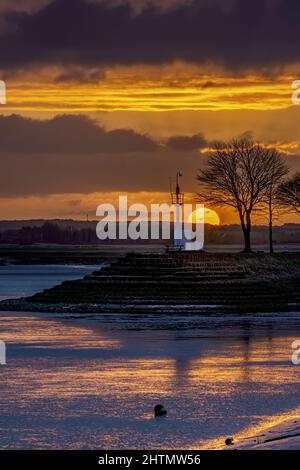 Saint Valery sur Somme, le soleil se lève dans la baie de Somme . Foto Stock