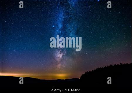 Galactic center of the milky way with many colors on a starry sky in deep space Stock Photo