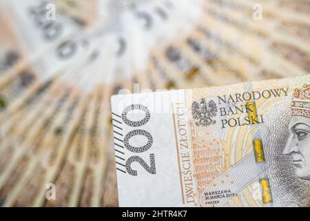 Concetto di politica monetaria polacca duecento banconote polacche Zloty PLN Mint Condition Foto Stock