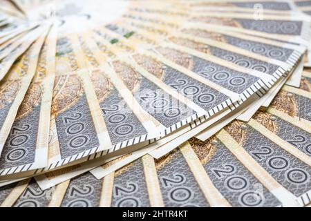 Concetto di politica monetaria polacca duecento banconote polacche Zloty PLN Mint Condition Foto Stock