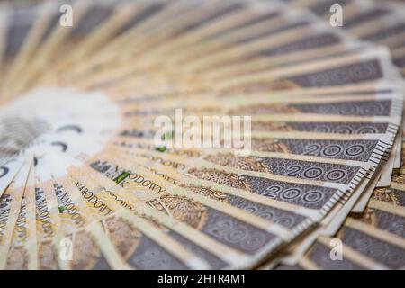 Concetto di politica monetaria polacca duecento banconote polacche Zloty PLN Mint Condition Foto Stock