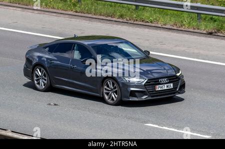 2019 grigio Audi A7 S LN BLK 50TDI MHEV Q SA 2967cc 8 velocità guida sequenziale automatica sulla M61 autostrada UK Foto Stock