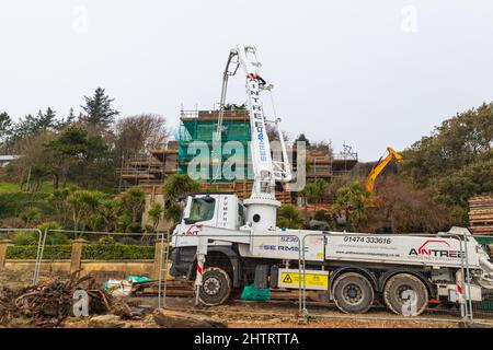 Pompa mobile per calcestruzzo, casa grande, livello di pett, East Sussex, regno unito Foto Stock