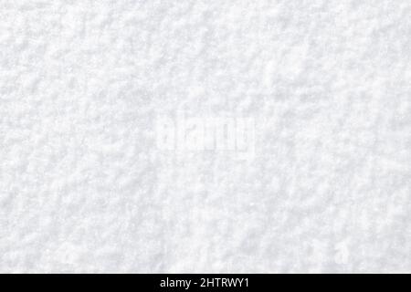Sfondo bianco con neve fresca. Full frame. Foto Stock