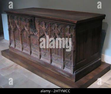 Arte ispirata da Chest con stemmi, primi del 16th secolo, francese, quercia, supporti in ferro; Parte superiore e base restaurate, totale: 32 3/4 x 70 1/4 x 28 1/4 poll. (83,2 x 178,4 x 71,8 cm), legno-Arredamento, sotto archi tardo gotici ogee, lo stemma reale francese di Carlo VIII (1483–98, opere classiche modernizzate da Artotop con un tuffo di modernità. Forme, colore e valore, impatto visivo accattivante sulle emozioni artistiche attraverso la libertà delle opere d'arte in modo contemporaneo. Un messaggio senza tempo che persegue una nuova direzione selvaggiamente creativa. Artisti che si rivolgono al supporto digitale e creano l'NFT Artotop Foto Stock