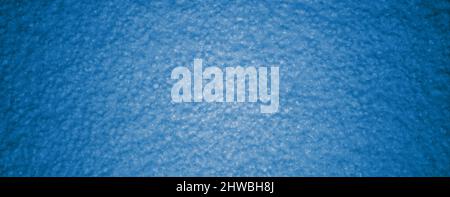 Banner web astratto a gradiente blu, sfondo di tessuto di neve in polistirene. Banner blu brillante con texture per uno sfondo di design. Foto Stock