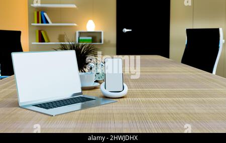 computer portatile e smartphone vengono simulati sul tavolo di lavoro, con rendering a 3d illustrazioni Foto Stock