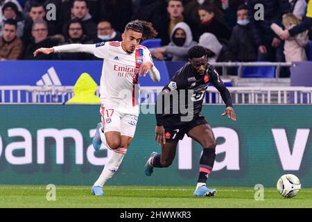 Lione, Francia - Febbraio 27: Malo gusto di Lione (L) insegue Jonathan Bamba di Lille (R) durante la partita Ligue 1 Uber mangia tra Olympique Lyonnais An Foto Stock