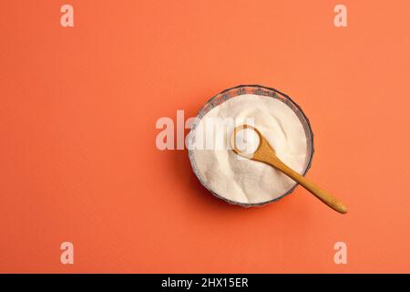 polvere di collagene idrolizzato nel recipiente di vetro Foto Stock