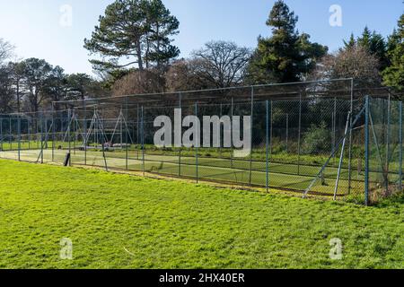 reti da cricket pratica sul lato del campo di cricket sport Foto Stock