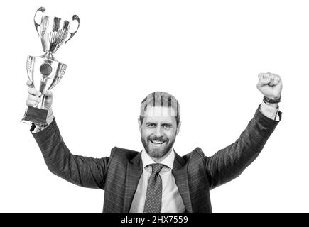 uomo d'affari di successo in tuta tenere champion cup s business ricompensa isolato su bianco, vittoria Foto Stock