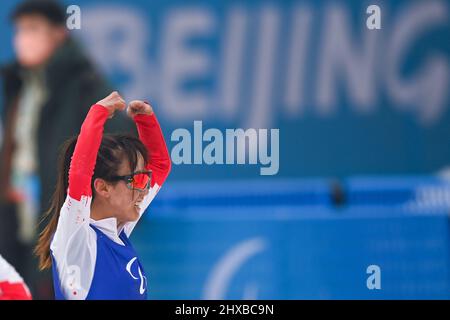 Zhangjiakou, la provincia cinese di Hebei. 11th Mar 2022. Zhao Zhiqing della Cina celebra dopo l'evento individuale di Pechino 2022 Paralimpic Winter Games presso il National Biathlon Centre di Zhangjiakou, nella provincia di Hebei, nella Cina settentrionale, il 11 marzo 2022. Credit: Li Bo/Xinhua/Alamy Live News Foto Stock