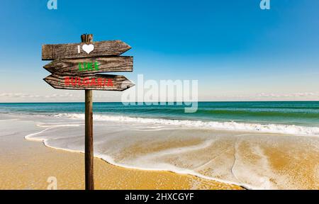 Signpost on the sandy beach at the Gold Beach on the Bulgarian Black Sea Coast Stock Photo