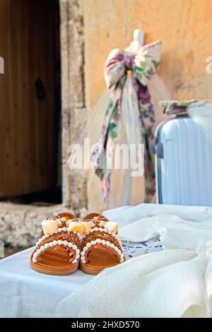 Scena di un battesimo (cerimonia di battesimo ortodossa) ad Ano Symi, un villaggio montano nel comune di Ierapetra, Lassithi, Creta, Grecia. Foto Stock