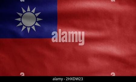 Bandiera taiwanese che sventola sul vento. Primo piano della bandiera taiwanese che soffia seta morbida. Tessuto tessuto tessuto tessuto tessuto insegne sfondo. Usalo per il giorno nazionale e il conto Foto Stock