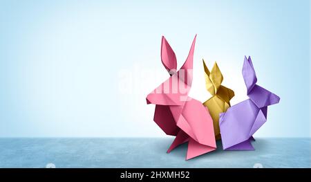 Coniglietti di Pasqua stagione come gruppo di carta coniglietto primavera o creativo aprile festivo arti stagionali e artigianato design con un coniglio origami. Foto Stock