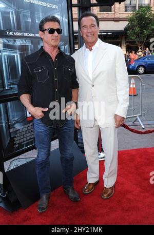 Sylvester Stallone e Arnold Schwarzenegger durante la prima 'Escape Plan' al Comic-con 2013 tenuto al Reading Cinemas Gaslamp, San Diego, California. Foto Stock