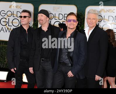 U2 e Bono partecipano ai Golden Globe Awards 71st, che si tengono al Beverly Hilton Hotel il 12 gennaio 2014. Foto Stock