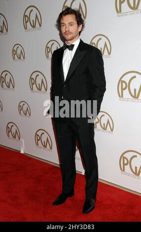 Hugh Dancy arriva per i 25th annuali Produttori Guild Awards al Beverly Hilton Hotel di Los Angeles, CA, USA, 19 gennaio 2014.