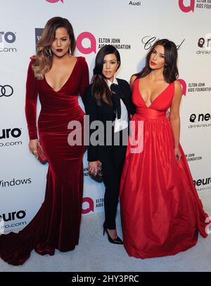 Khloé Kardashian, Kourtney Kardashian e Kim Kardashian in arrivo per l'Elton John AIDS Foundation Academy Awards 2014 Viewing Party tenuto a West Hollywood Park, Los Angeles. - L'annuale 22nd Sir Elton John Oscar Party - Los Angeles. Foto Stock