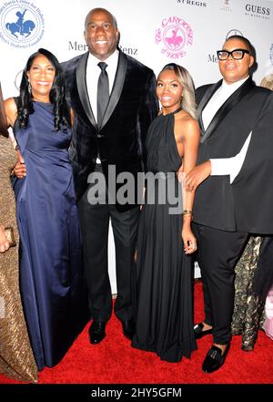 Cookie Johnson, E.J. Johnson, Elisa Johnson, Magic Johnson frequentando il Carousel of Hope Ball 2014, che si tiene al Beverly Hilton Hotel di Los Angeles, California. Foto Stock