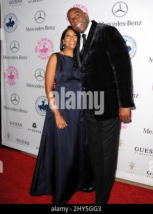 Cookie Johnson, Magic Johnson frequenta la giostra della Hope Ball del 2014, che si tiene al Beverly Hilton Hotel di Los Angeles, California. Foto Stock