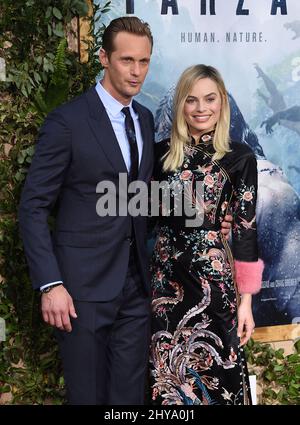 Alexander Skarsgard & Margot Robbie partecipa alla prima mondiale della leggenda di Tarzan tenutasi al Dolby Theatre di Hollywood, California. Foto Stock