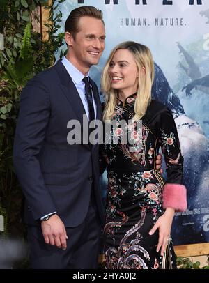 Alexander Skarsgard & Margot Robbie partecipa alla prima mondiale della leggenda di Tarzan tenutasi al Dolby Theatre di Hollywood, California. Foto Stock