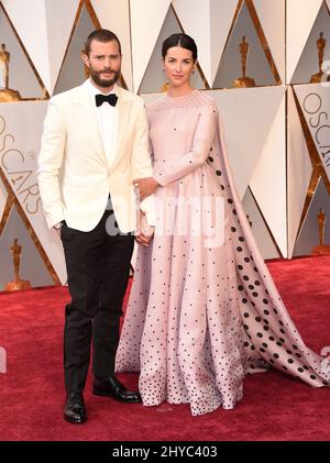 Jamie Dornan, Amelia Warner ai 89th Academy Awards tenuti al Dolby Theatre Foto Stock