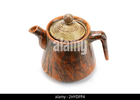 Antica tea pot in pietra su sfondo bianco Foto Stock