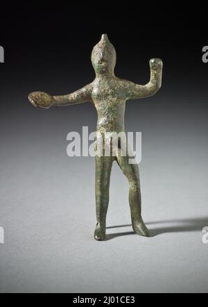 Figura maschio. Italia, 7th-6th secolo a.C. Scultura. Bronzo Foto Stock