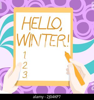Testo che mostra l'ispirazione Ciao inverno. Panoramica aziendale stagione più fredda dell'anno in zone polari e temperate disegno di entrambe le mani tenere Tablet Foto Stock