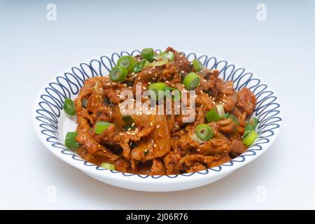 Braciole di maiale piccante fritte su un piatto Foto Stock