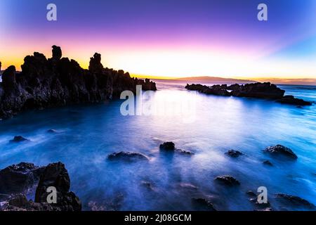 Playa Alcala Tenerife Spiaggia rocciosa tramonto Foto Stock