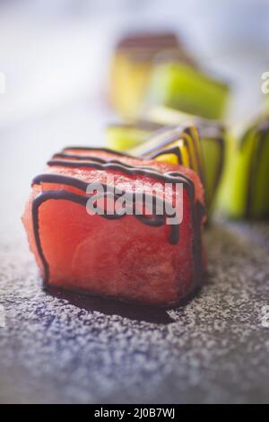 Melone all'anguria e dessert al cioccolato all'ananas Foto Stock