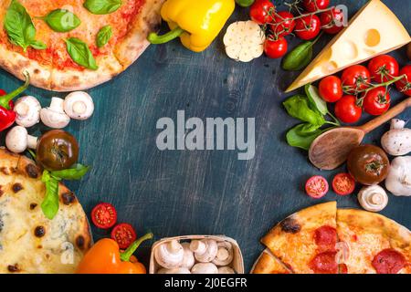 Pizza e ingredienti sfondo Foto Stock