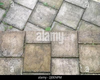 Vecchie lastre di pavimentazione dall'alto Foto Stock