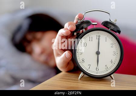 Ora legale donna risveglio Foto Stock