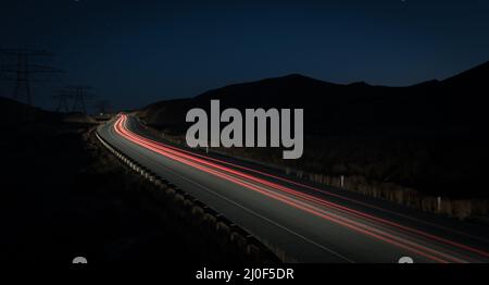 Percorsi leggeri da auto in rapido movimento Foto Stock